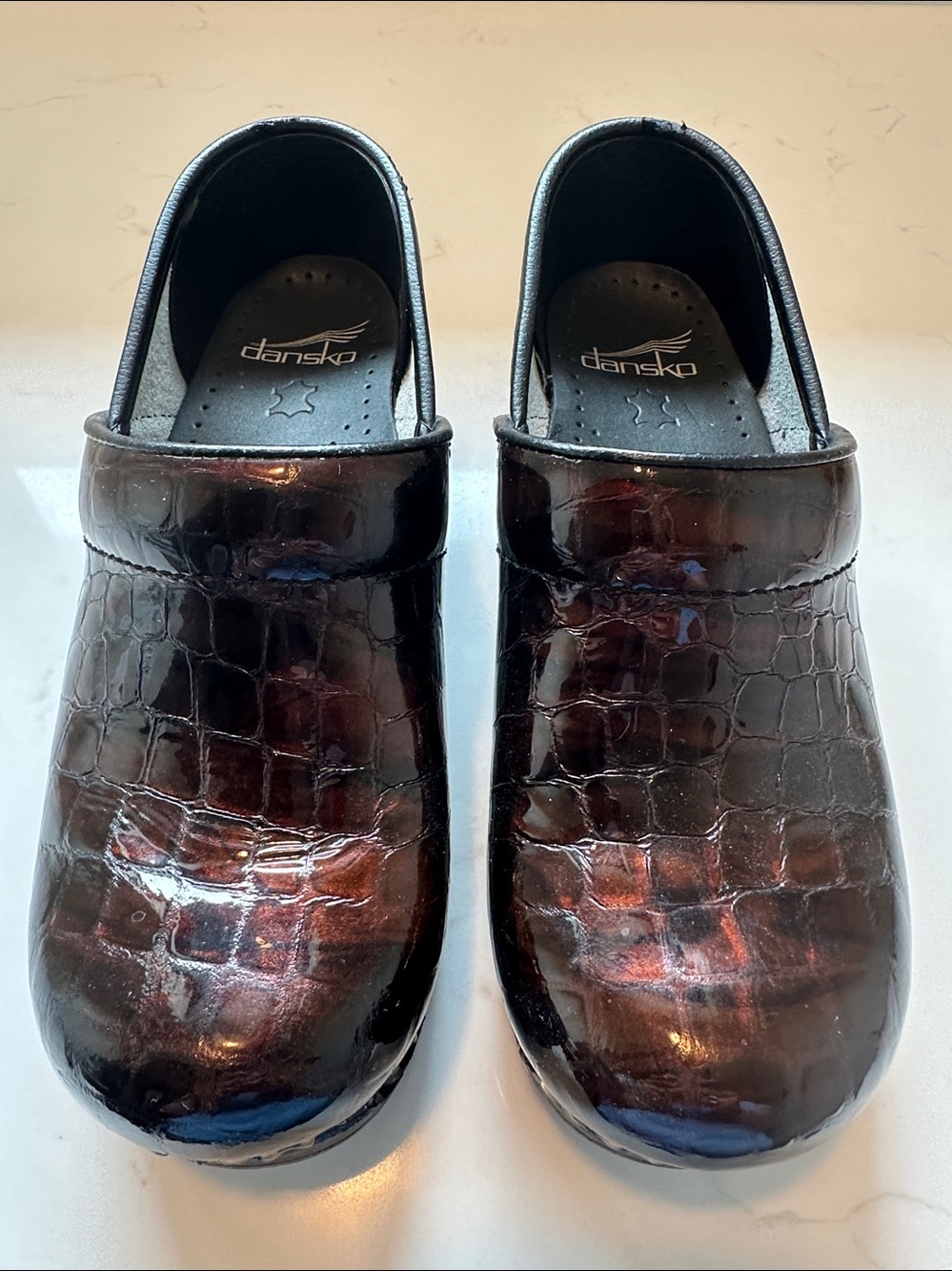 DANSKO Croc-Embossed Patent Clogs in Dark Brown
